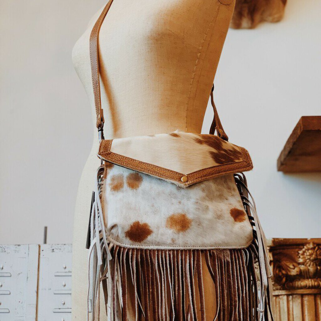 COWHIDE CROSSBODY WITH FRINGE