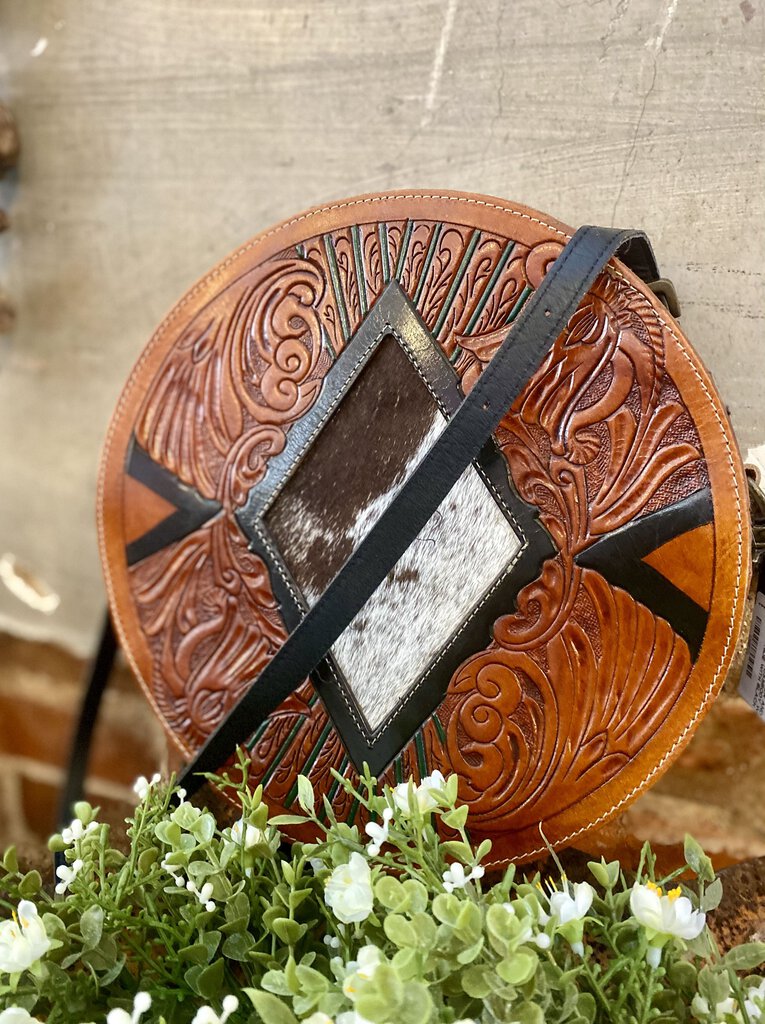 TOOLED LEATHER AND COWHIDE CIRCLE CROSSBODY